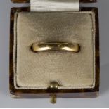 A 22ct gold plain wedding ring, Birmingham 1957, ring size approx O1/2, with a case.Buyer’s