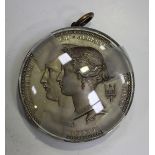 A silver medallion commemorating the coronation of King George IV 1821, a group of medallions