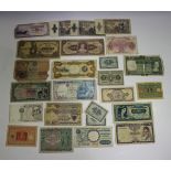 A collection of banknotes of the world, including Italy, Bahrain, Venezuela, Portugal, Singapore,