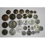 A collection of bronze and white base metal medallions commemorating the Duke of Wellington and