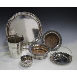 A small group of plated items, including a pair of wine coasters and an ice bucket, together with