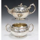 A Victorian Scottish silver teapot and matching two-handled sugar bowl, each of compressed