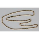 A 9ct gold faceted curblink neckchain on a sprung hook shaped clasp, length 57.5cm.Buyer’s Premium