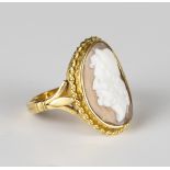 A gold and oval shell cameo ring, carved as a portrait of a bearded classical gentleman within a