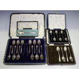 A set of twelve George V silver teaspoons and matching sugar tongs, Sheffield 1918 by Cooper