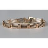 A gold gate link bracelet on a snap clasp, length 19.5cm.Buyer’s Premium 29.4% (including VAT @ 20%)