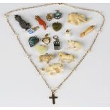 A gold and seed pearl pendant necklace, length 43cm, the front with a cross motif, and seventeen