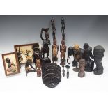 A collection of late 20th century African carved wooden items, other African artwork and an early