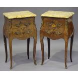 A pair of 20th century French kingwood bedside tables with marble tops and foliate inlay, bearing