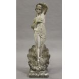 A 20th century cast composition stone garden figure of Venus emerging from a scallop shell, height