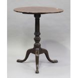 A late George III mahogany circular tip-top wine table, raised on a spiral reeded stem and tripod