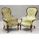 A mid-Victorian mahogany showframe gentleman's salon armchair, upholstered in buttoned green velour,