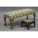 A mid-20th century beech framed rectangular stool, the needlework seat raised on cabriole legs,