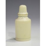 An early 20th century ivory miniature bottle case of cylindrical form with screw cover and base