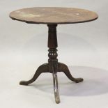 A George III provincial oak circular wine table, on tripod legs, height 69cm, diameter 78cm,