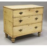 A Victorian pine chest of three long drawers, height 84cm, width 94cm, depth 51cm.Buyer’s Premium