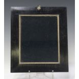 A Victorian ebonized and gilt brass mounted frame, the suspension ring with acorn and oak leaf