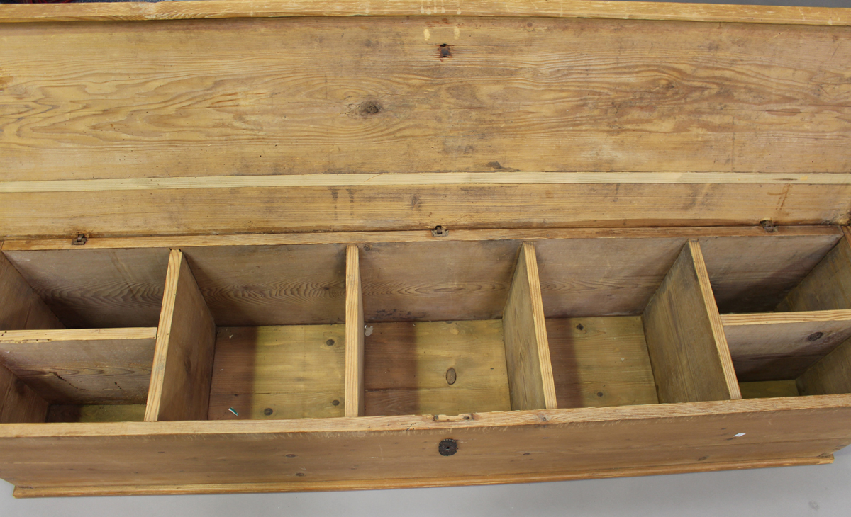 A late 19th century long pine trunk, the hinged lid enclosing a compartmentalized interior, height - Image 2 of 4