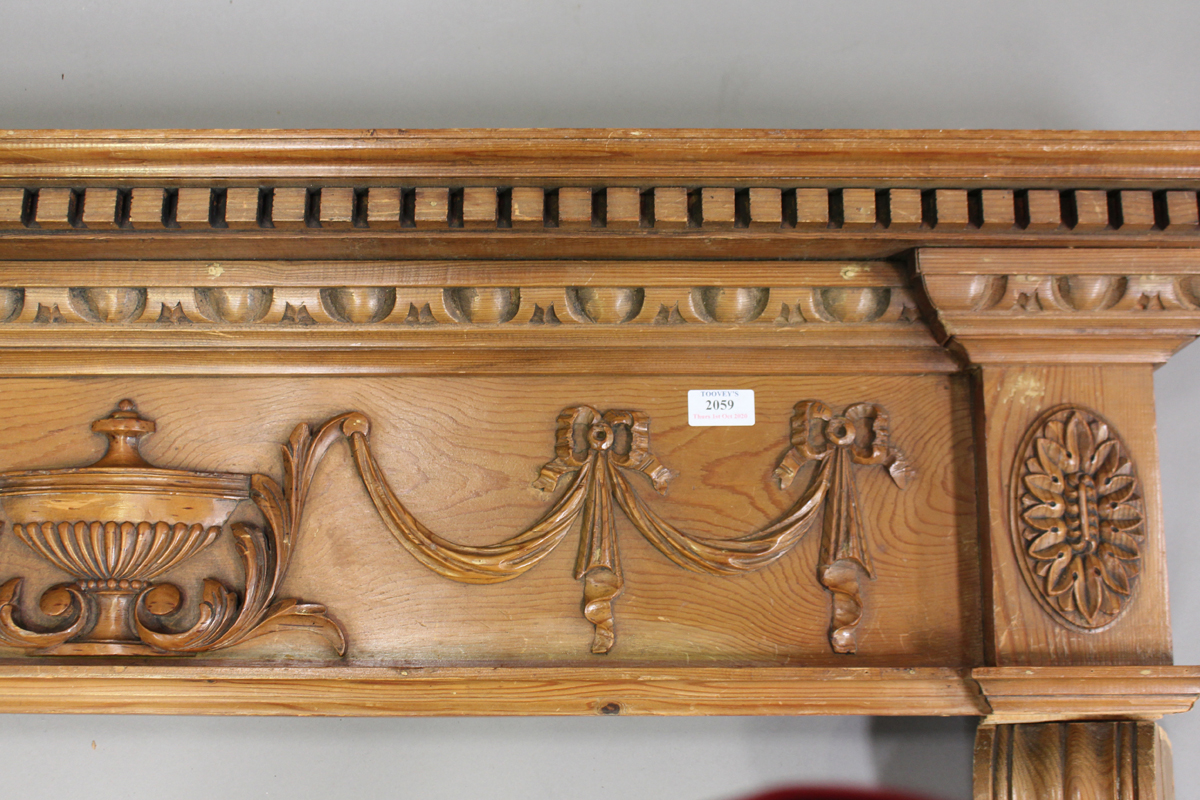 An early 20th century Neoclassical Revival pine fire surround, the frieze carved with central urn, - Image 3 of 4