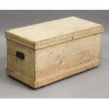 A 19th century pine trunk, the hinged lid enclosing compartmentalized trays, height 50cm, width