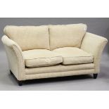 A modern tub back sofa by Parker Knoll, height 74cm, width 180cm, depth 95cm.Buyer’s Premium 29.