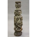 An 18th/19th century South Asian carved softwood figural totem column, length 88cm (faults).Buyer’