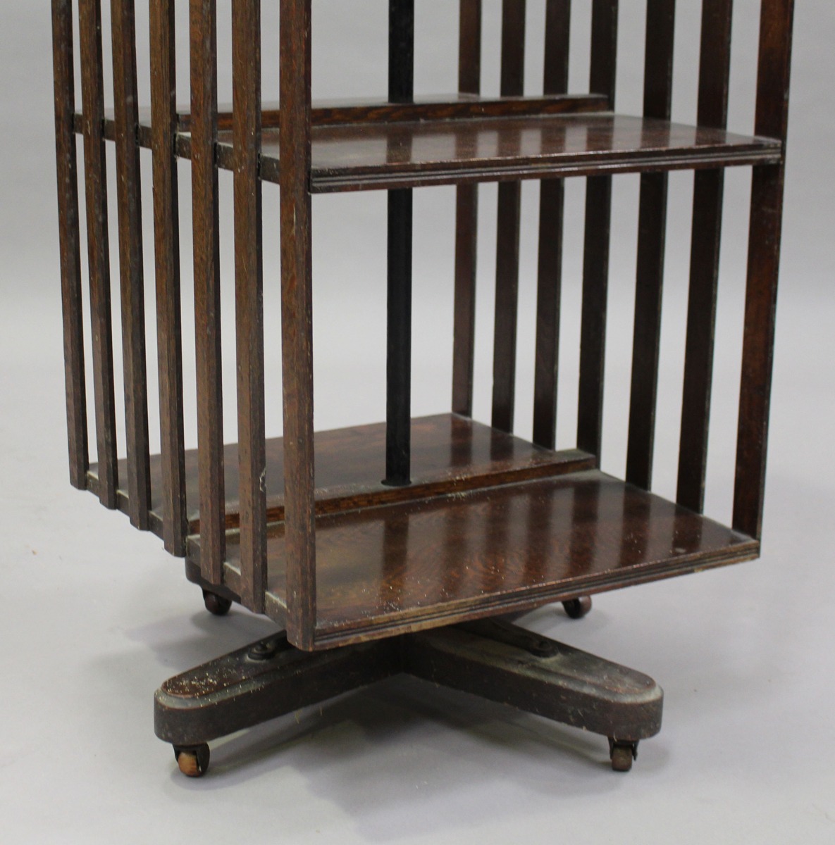 A George V oak revolving bookcase with a gadrooned edge and slatted sides, height 106cm, width - Image 2 of 3