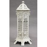 A late Victorian white painted cast metal hexagonal conservatory heater casing of pierced form,