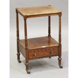 A Regency mahogany two-tier whatnot, fitted with a drawer and raised on brass caps and castors,