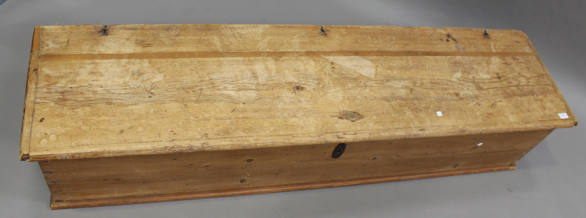 A late 19th century long pine trunk, the hinged lid enclosing a compartmentalized interior, height - Image 4 of 4