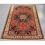 A Tafresh rug, North-west Persia, mid-20th century, the pale claret field with a midnight blue
