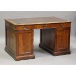 A Victorian and later figured mahogany twin-pedestal desk, the moulded top above three drawers and