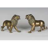 A pair of early 20th century Indian brass models of standing lions, in the manner of B.M. Patole,