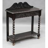 A late Victorian Carolean Revival carved oak hall table, height 92cm, width 83cm, depth 35cm.Buyer’s