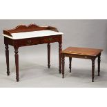 A late Victorian mahogany marble-topped washstand, the gallery back above two dummy drawers,