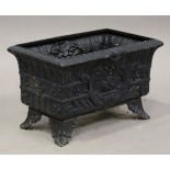 A late 20th century Regency style black painted cast metal garden planter, detailed 'The Eton Trough