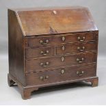 A George III mahogany bureau, the fall front enclosing a fitted interior, height 107cm, width 110cm,