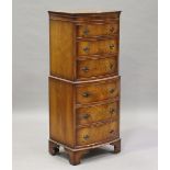 A mid-20th century walnut bowfront tallboy, fitted with six drawers, height 130cm, width 54cm, depth