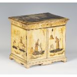 A mid-19th century chinoiserie table top needlework cabinet, the hinged lid above two doors