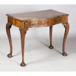 A George III figured mahogany serpentine-fronted side table, fitted with a single oak-lined