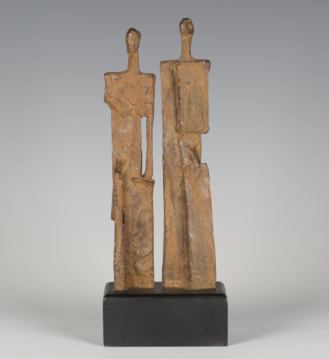 Nicolas Joosten - a mid/late 20th century brown and iron red patinated cast bronze abstract figure