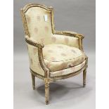 A late 18th century French Louis XVI period painted walnut showframe fauteuil armchair,