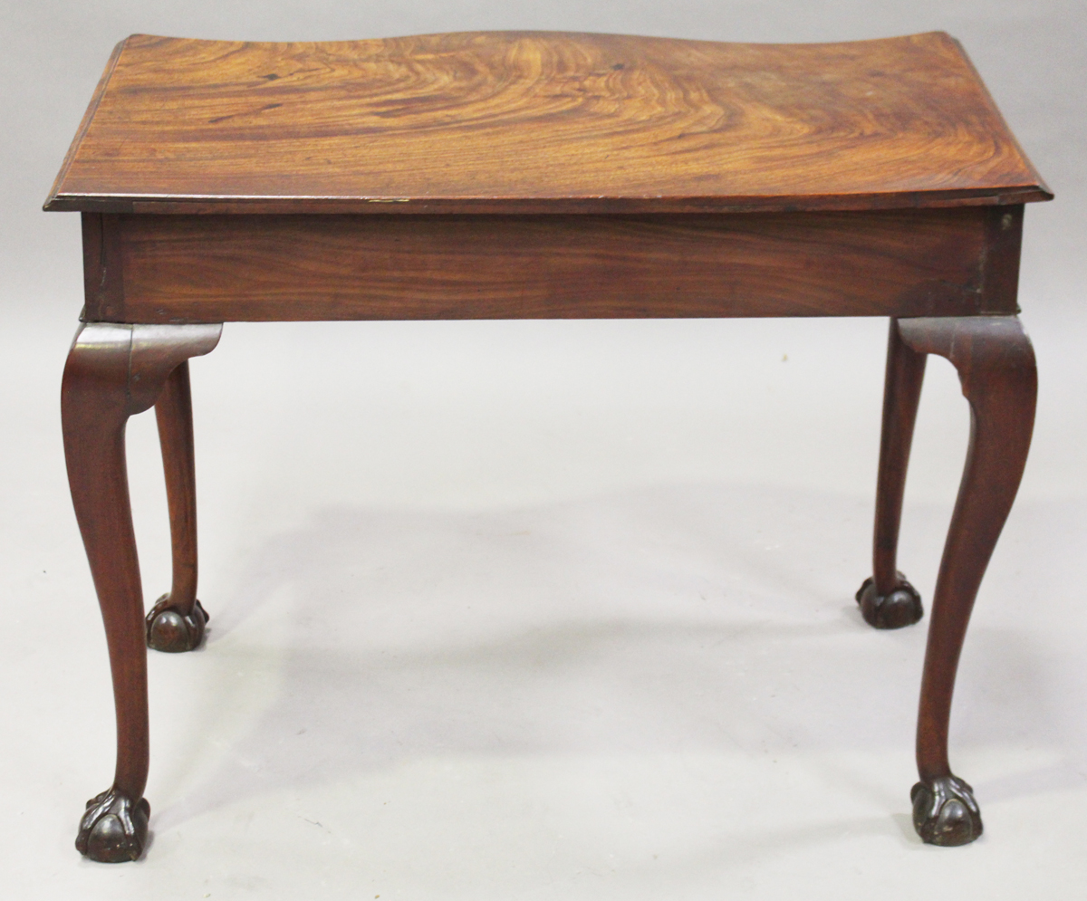 A George III figured mahogany serpentine-fronted side table, fitted with a single oak-lined - Image 8 of 10