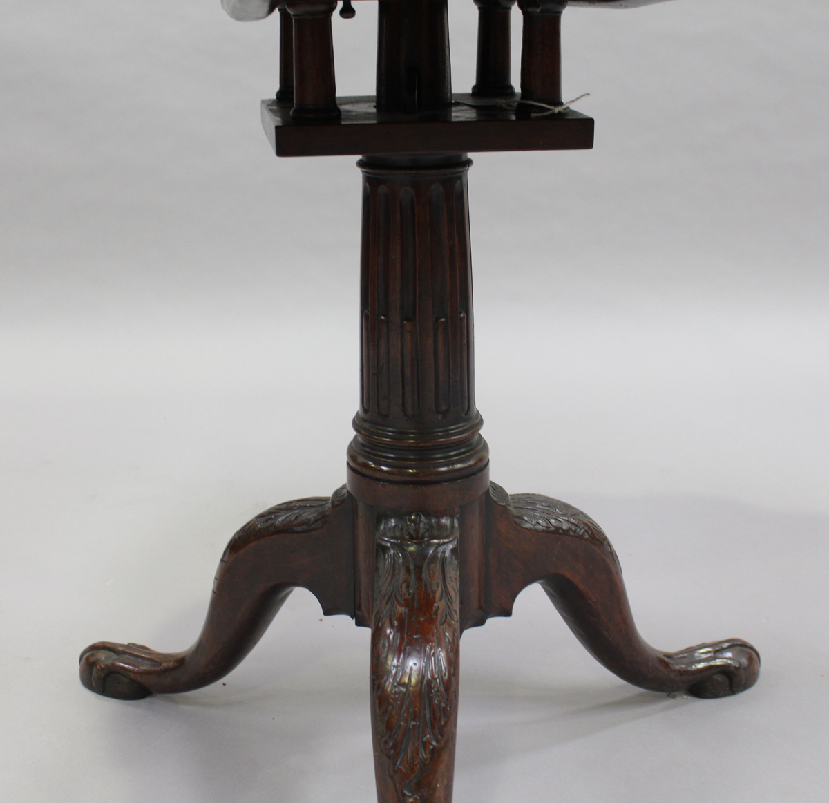 A George III mahogany tip-top supper table, the circular top later carved with nine roundels and - Image 4 of 5