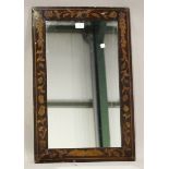 A late 19th century Dutch marquetry framed wall mirror, inlaid with flowers and leaves, height 73cm,