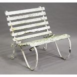 An early 20th century wrought iron and wooden slatted garden seat, height 77cm, width 77cm (