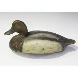An early 20th century painted pine decoy duck, length 35cm.Buyer’s Premium 29.4% (including VAT @