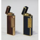 A Dunhill gilt metal and dark blue lacquered rectangular gas lighter, detailed 'Made in