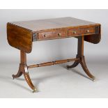 A Regency mahogany sofa table with coromandel crossbanding and boxwood stringing, the two frieze