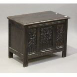 A 20th century Gothic Revival oak coffer, the front inset with three tracery panels, height 58cm,